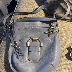 Blue leather cross body. Approximately 10 X 10